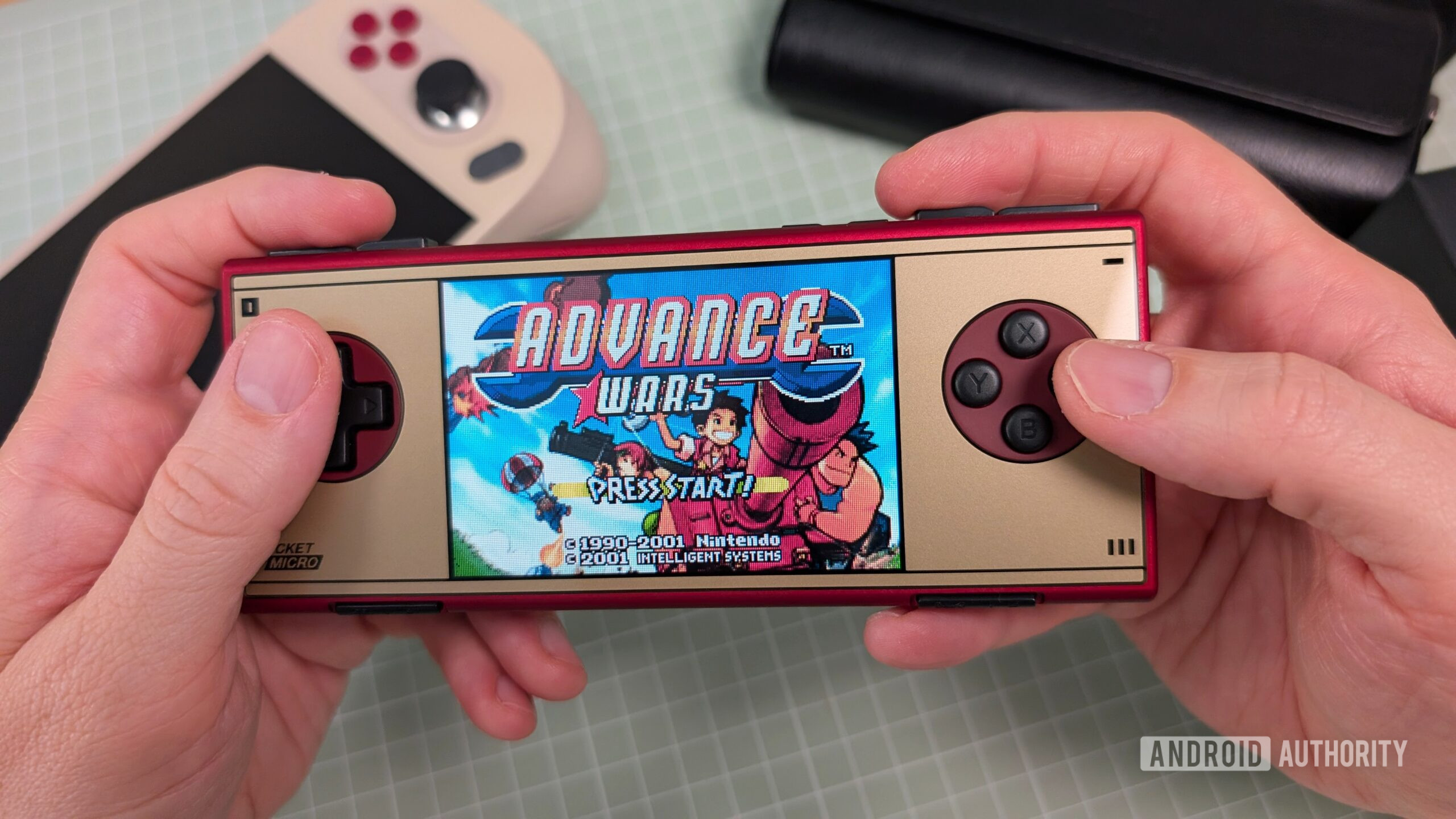 AYANEO Pocket Micro Classic Advance Wars in hand AYANEO Pocket Micro Classic Advance Wars in hand