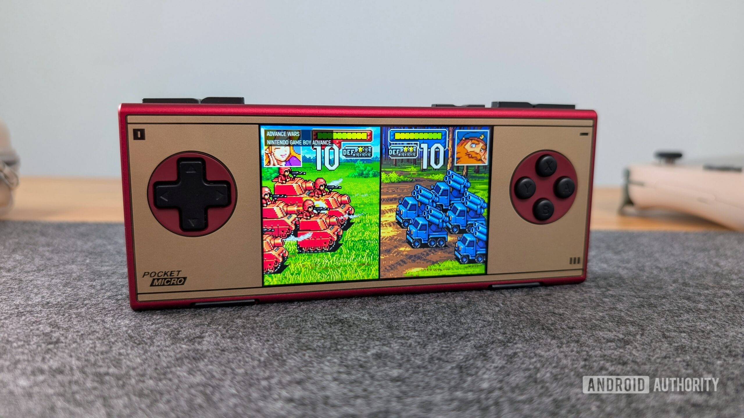 AYANEO Pocket Micro Classic Advance Wars on table AYANEO Pocket Micro Classic Advance Wars on table