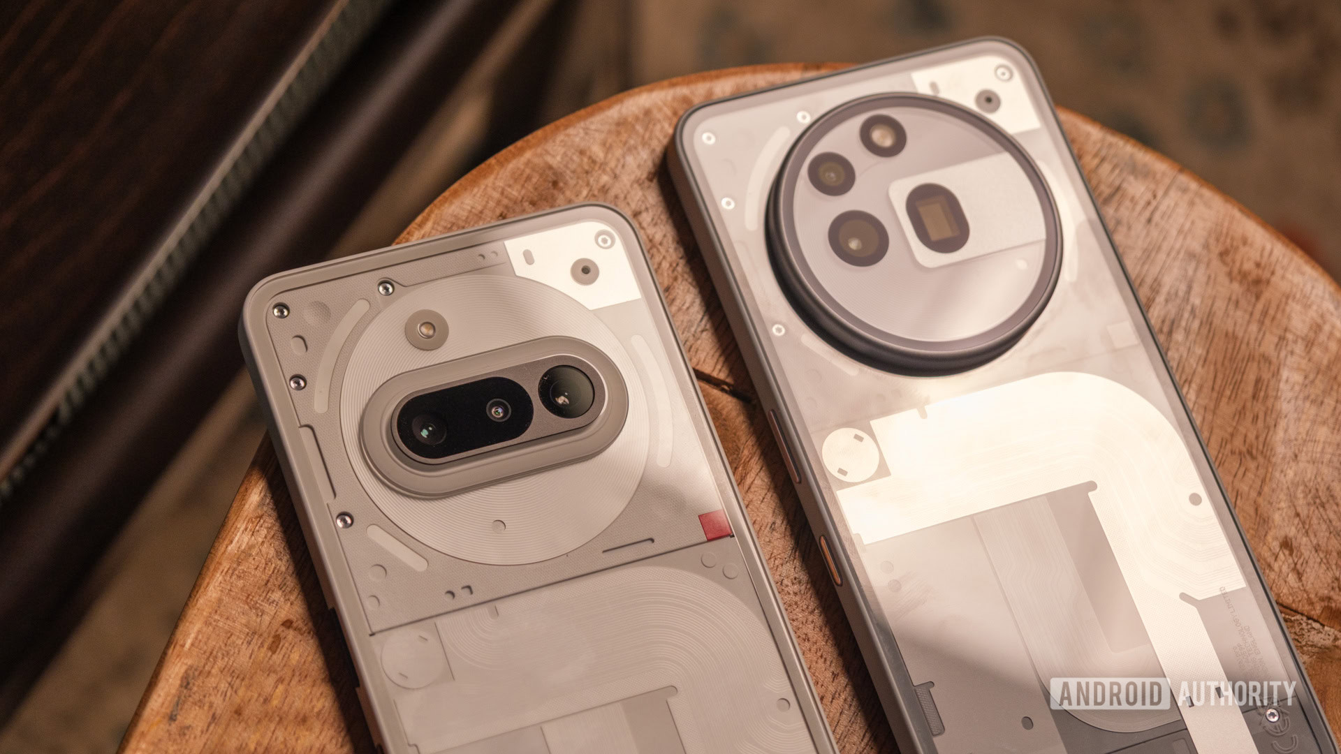 Nothing Phone 3a lying next to Phone 3a Pro Nothing Phone 3a lying next to Phone 3a Pro
