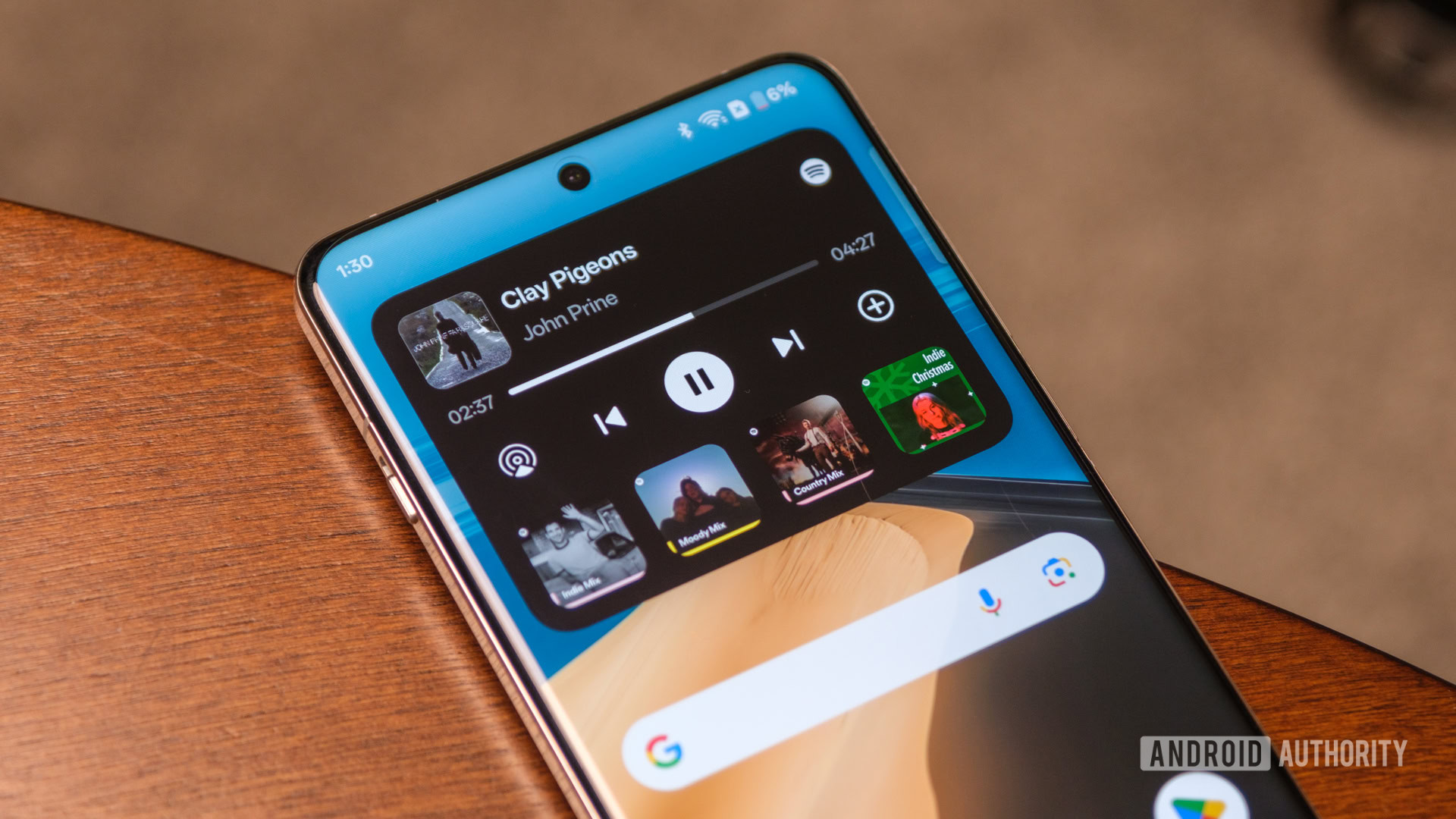 OnePlus 13 live alert spotify