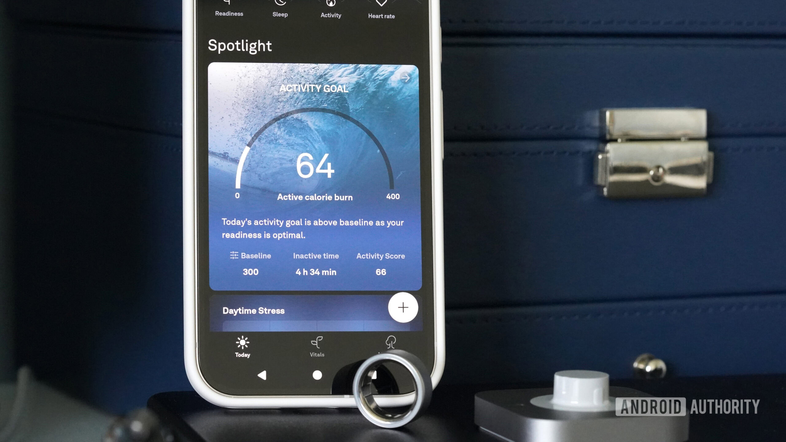A Pixel 9 displays the Oura app spotlighting a user's activity data.