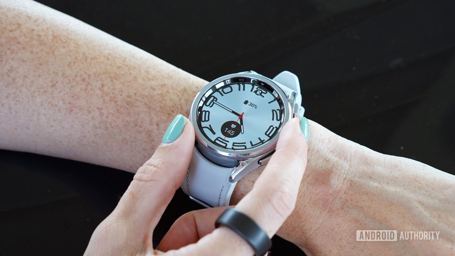 Samsung Galaxy Watch 6 Classic Stretched Time A Samsung Galaxy Watch 6 Classic displays the Stretched Time watch face.