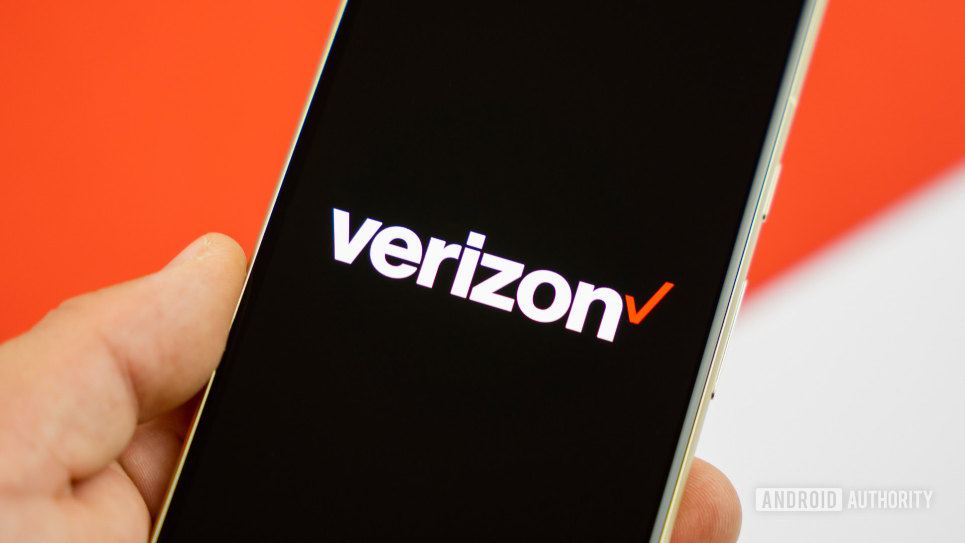 Verizon logo on smartphone with a colored background Stock photo 12 Verizon logo on smartphone with a colored background Stock photo 12