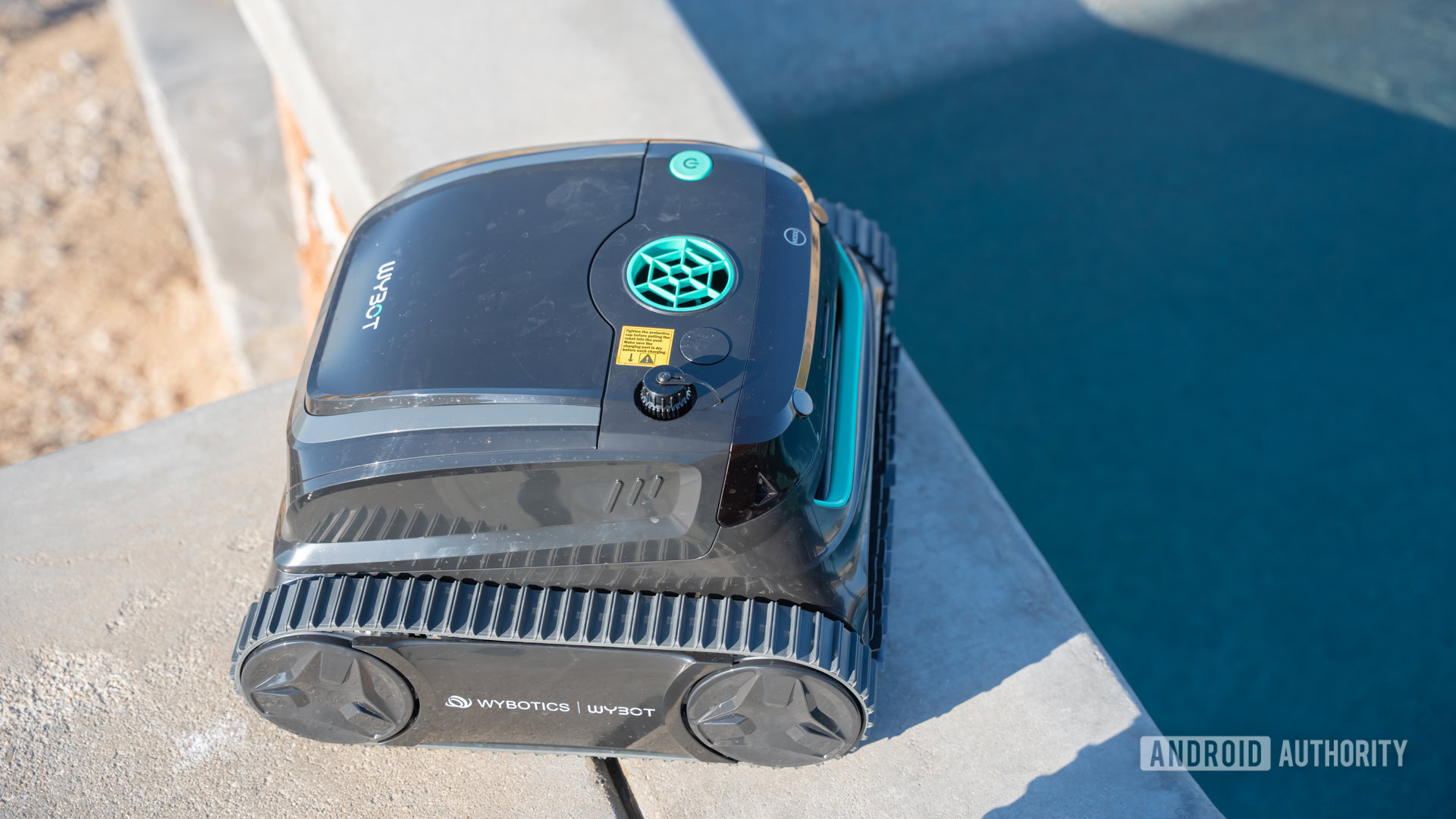 Wybot S2 Solar next to pool 3 Wybot S2 Solar next to pool 3